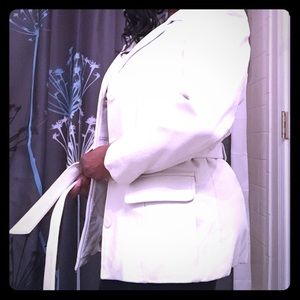 Wilson’s white leather coat with belt